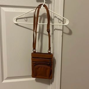 Small, brown, shoulder bag.